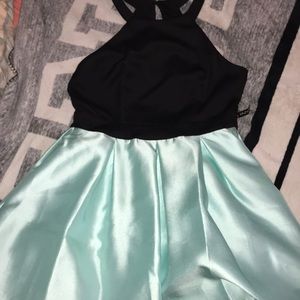 Teal dress with black halter top. Size:14